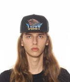 LUCKY BASTARD LOGO TRUCKER HAT IN BLACK