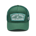 Cult's Mesh Trucker Hat "Good At Bad Decisions" In Bayberry  626AC-CH75A