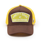 Cult's Logo Mesh Back Trucker Hat "Good At Bad Decisions" in Chocolate 625BC-CH81A